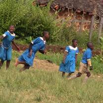 Students playing in the field.