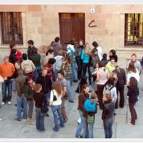 People gathering outside a building.