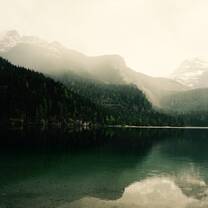mountains lake water clouds reflection