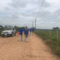 Participants doing home visits in Belize