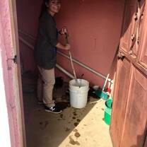 Med Fellow mixing a chlorine solution