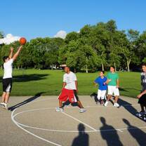 boys are playing basketball