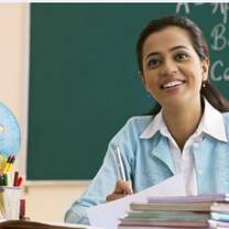 a teacher holding a pencil and books