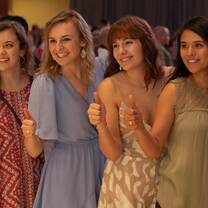 Four beautiful ladies saying OKAY sign