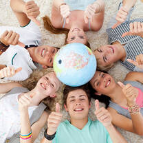 group of people with the globe on their heads
