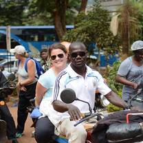 man and a woman in a motorcycle