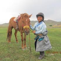 Little girl and her horse