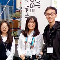 three students wearing eyeglasses