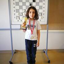 little boy and his awards