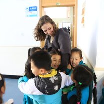 Shanghai TEFL Course kids hugging woman