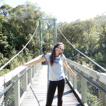 a photo of me on a bridge at the Zealandia sanctuary