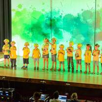 kids on the stage standing
