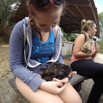 girl holding the animal