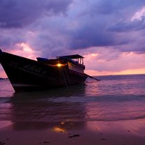 A fantastic sunset over the seas of Thailand with our boat in the mid ground.