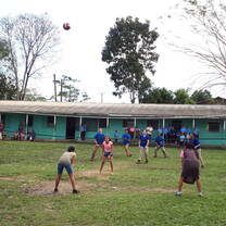 Participants playing with school children.