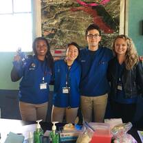 Medical Fellows and high school participants during a health fair