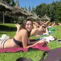 Lounging by the pool at a lemon and olive grove in Colonia, Uruguay with new friends.