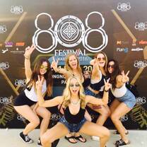 group of five girls in front of step and repeat at 808 Festival Thailand