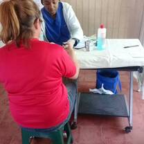 Medical Fellow performing a glucose test