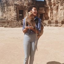 Picture of me in Lopburi, Thailand holding wild monkeys.