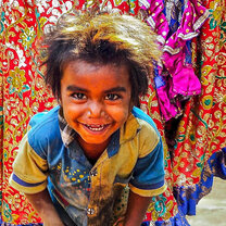 A mischievous smile A boy with a smile that I will light up with world.