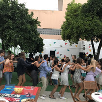 All the students, staff, and crew are joined together in a Congo line to celebrate one of the last nights together. 