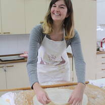 girl making Greek food