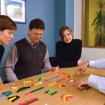 group of men and women having a group discussion