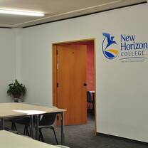 image of a open door leading to a classroom