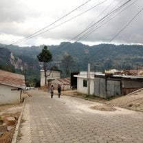 Nicaraguan Town image with mountains, dusty streets.