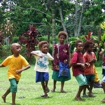 kids playing on the grass
