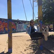 On a swing at the historic Mauer Park, which has a large flea market on Sundays 