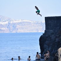 Cliff jumping in Santorini