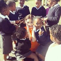 At the pre school teaching and getting my hair done with help from the kids! 