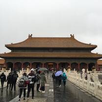 Picture of the Forbidden City - Our class visited the Forbidden City, where we saw amazing architecture and were amazed by the size of the palace. Unexpectedly, as we were exploring, it began to snow, and soon the snow began to pound down, soaking our clothes and shoes. Although the snow caught us off guard and we weren't really dressed for it, it made the experience even more memorable.  