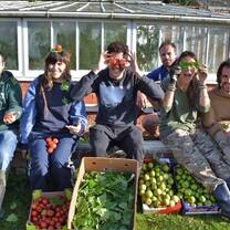 Volunteers with fresh crops 