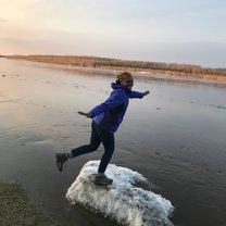 Standing on ice during the spring ice break on the Lena River