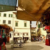 "Streets of Florence"  This is a picture from my photography class. I took it because I thought it captured the culture of Florence. This was taken inside one of the many leather markets on the streets.
