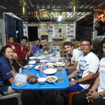Eating dinner with my host family and friends 