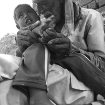 After volunteering in a village, I was able to see a man with his grandson