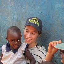Volunteer with Ugandan school student