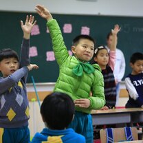 Students raising hands Students raising hands