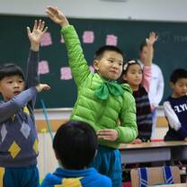 Students raising hands