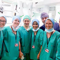 Students and hospital staff in scrubs