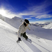Canadians can ski or snowboard the Southern Alps while on working holiday in New Zealand