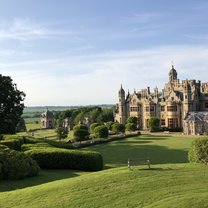 Side view of the lawn and manor 