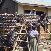 Local Volunteering community members helping with Rainwater Harvesting Tank Construction