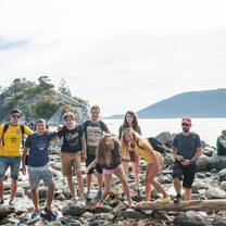 Group of people standing on beach in Vancouver