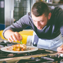 Man in culinary class