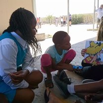 Reading to kids at GAPA